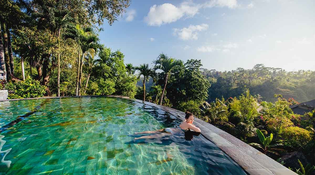 Where to Stay in Bali for the Best Beaches: 2026 Area-by-Area Guide 1 infinity swimming pool overlooking tropical jungle