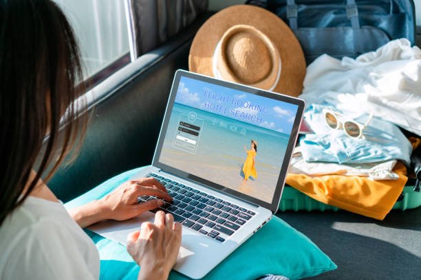 Solo Travel Tips for Women: Your Ultimate Guide to Safe, Confident, and Fulfilling Adventures 1 oman planning solo trip with map and laptop - solo travel tips for women